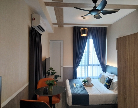 Imagen de la habitación del Hotel Cubic Botanical Suites Homebrickz. Foto 9