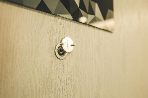 Imagen de la habitación del Hotel Cubic Pratunam. Foto 7