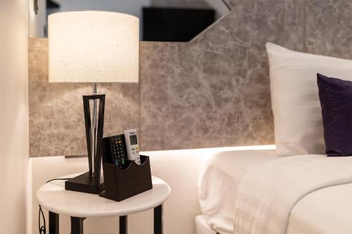 Imagen de la habitación del Hotel Cubic Pratunam. Foto 10