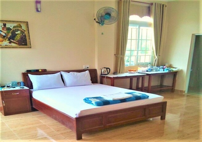 Imagen de la habitación del Hotel Cuc Phuong. Foto 18