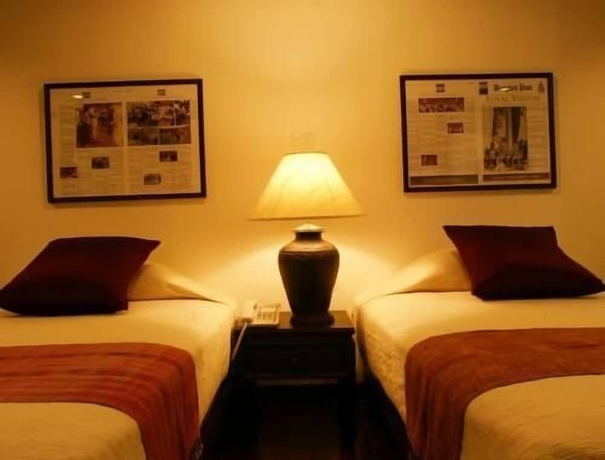 Imagen de la habitación del Hotel Cucumber Inn. Foto 6