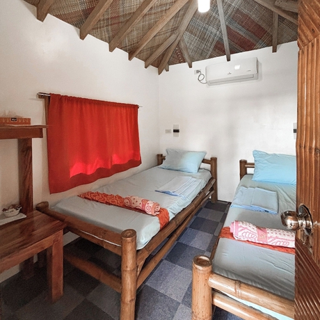 Imagen de la habitación del Hotel Cuestas Beach Resort and Restaurant. Foto 3
