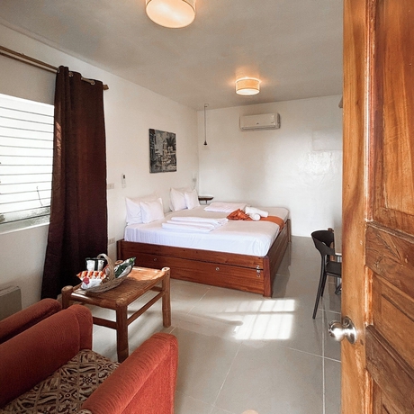 Imagen de la habitación del Hotel Cuestas Beach Resort and Restaurant. Foto 5