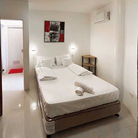 Imagen de la habitación del Hotel Cuestas Beach Resort and Restaurant. Foto 7
