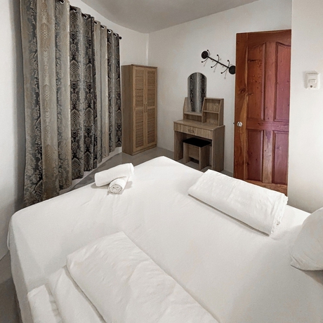 Imagen de la habitación del Hotel Cuestas Beach Resort and Restaurant. Foto 8