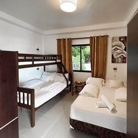 Imagen de la habitación del Hotel Cuestas Beach Resort and Restaurant. Foto 11