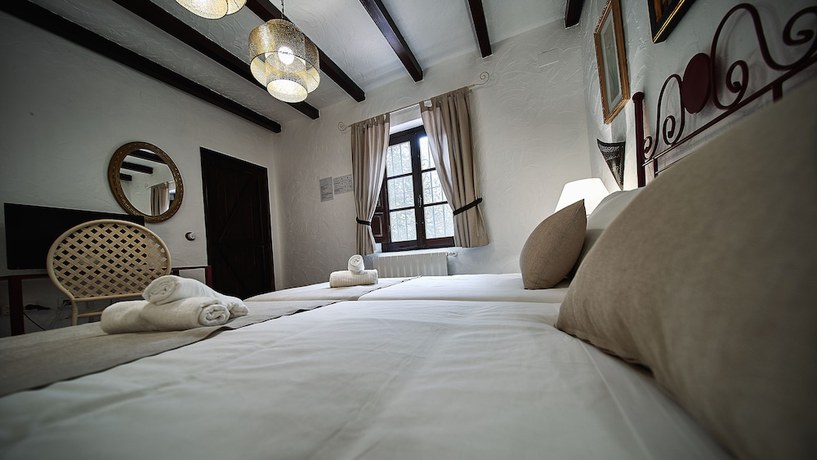 Imagen de la habitación del Hotel Cueva Del Gato. Foto 15