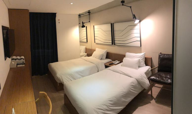Imagen de la habitación del Hotel Cullinan Jeju. Foto 11