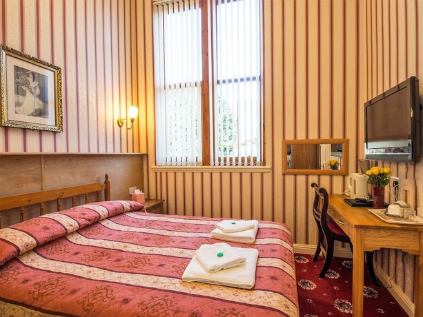 Imagen de la habitación del Hotel Cumberland. Foto 16