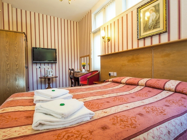 Imagen de la habitación del Hotel Cumberland. Foto 17