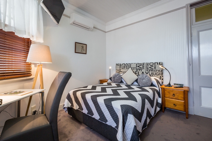 Imagen de la habitación del Hotel Cumquat House. Foto 9