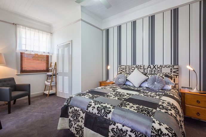 Imagen de la habitación del Hotel Cumquat House. Foto 10