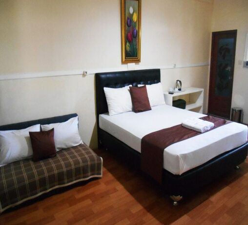 Imagen de la habitación del Hotel Cunang Hill and Resort. Foto 16