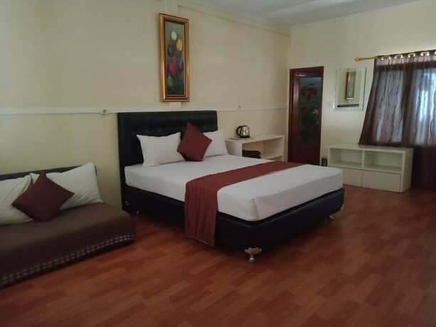 Imagen de la habitación del Hotel Cunang Hill and Resort. Foto 17