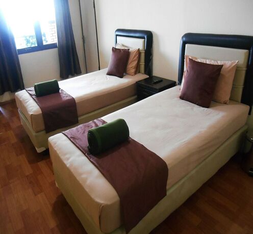 Imagen de la habitación del Hotel Cunang Hill and Resort. Foto 18
