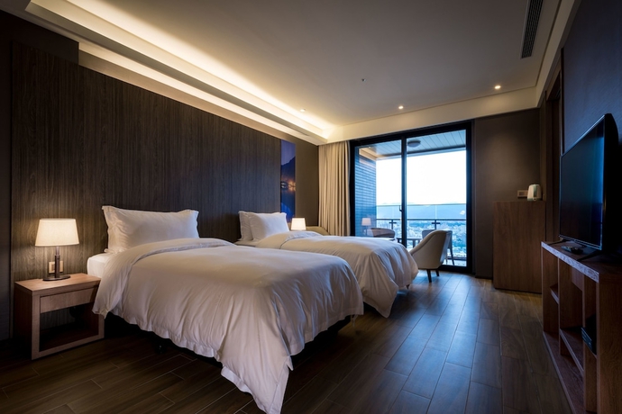 Imagen de la habitación del Hotel Cuncyue Hot Spring Resort. Foto 8