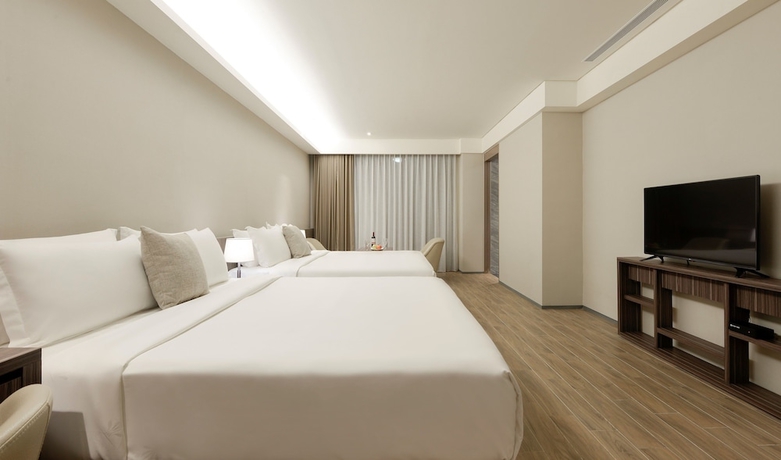 Imagen de la habitación del Hotel Cuncyue Hot Spring Resort. Foto 11