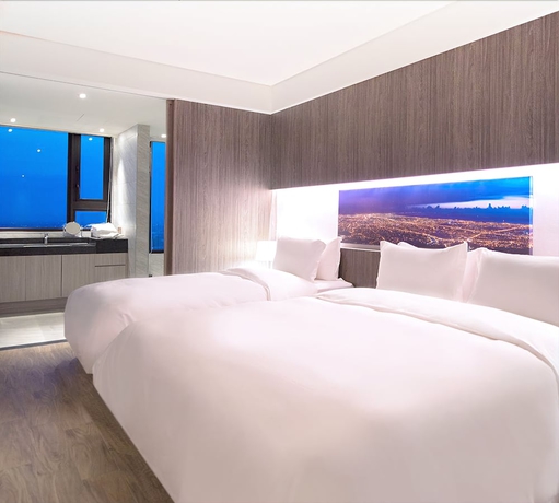 Imagen de la habitación del Hotel Cuncyue Hot Spring Resort. Foto 12