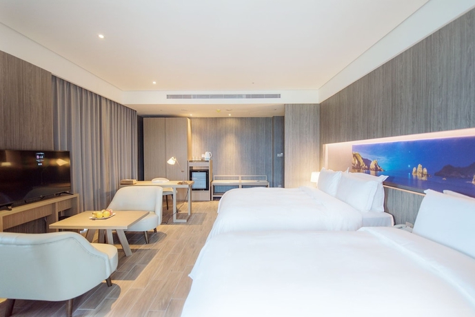 Imagen de la habitación del Hotel Cuncyue Hot Spring Resort. Foto 14