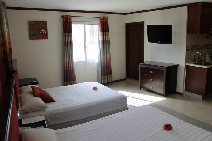 Imagen de la habitación del Hotel Curacao Suites. Foto 4