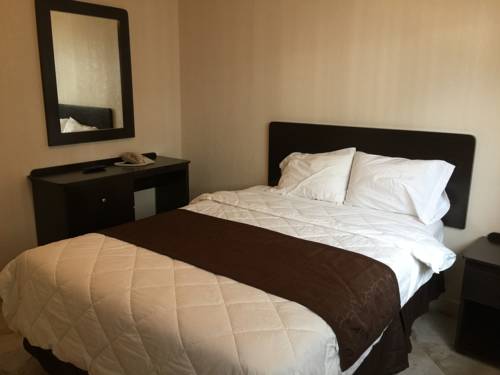 Imagen de la habitación del Hotel Curtis Inn & Suites. Foto 7