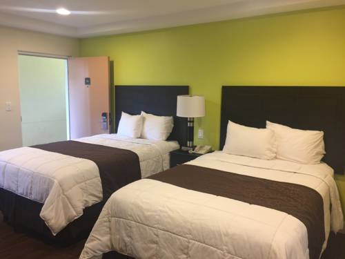 Imagen de la habitación del Hotel Curtis Inn & Suites. Foto 9