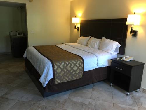 Imagen de la habitación del Hotel Curtis Inn & Suites. Foto 14