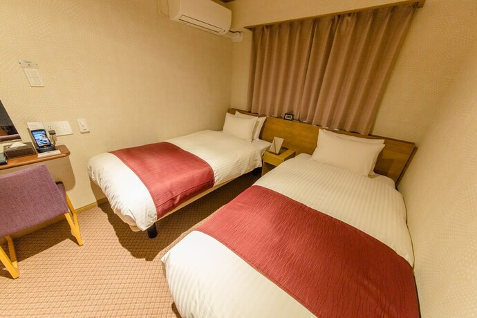 Imagen de la habitación del Hotel Cutter Inn Kyoto. Foto 10