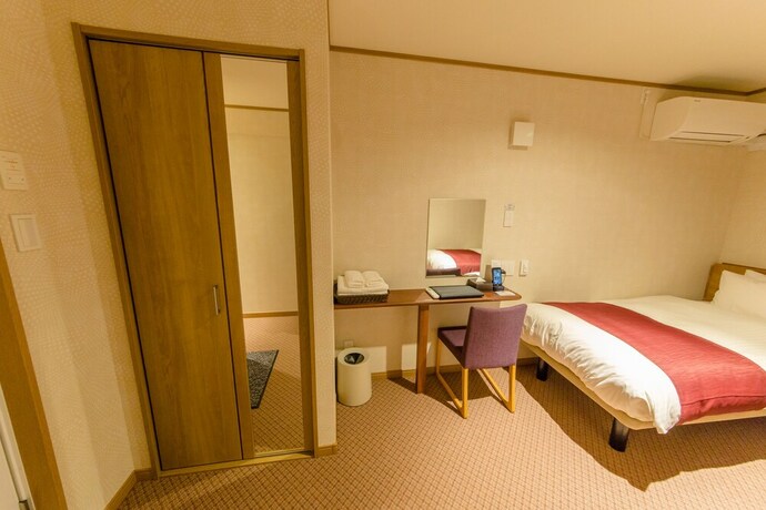 Imagen de la habitación del Hotel Cutter Inn Kyoto. Foto 16