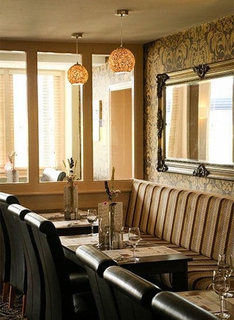 Imagen del bar/restaurante del Hotel Cuttle Bridge Inn. Foto 2