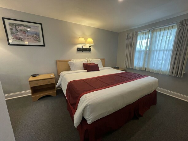 Imagen de la habitación del Hotel Cutty Sark Motor Lodge. Foto 19