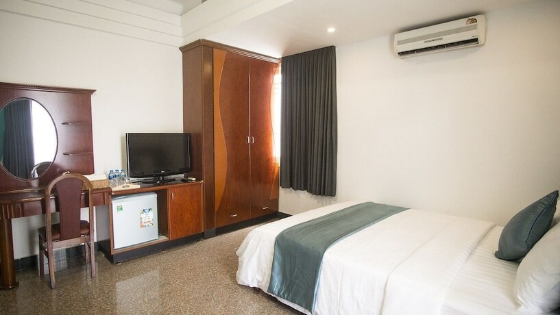 Imagen de la habitación del Hotel Cuu Kim Son. Foto 21