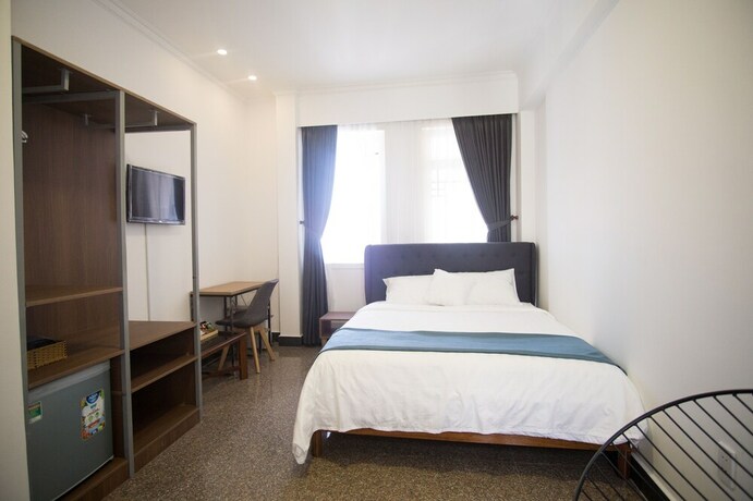 Imagen de la habitación del Hotel Cuu Kim Son. Foto 24