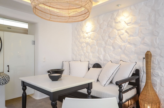 Imagen de la habitación del Hotel Cyano Suites. Foto 12