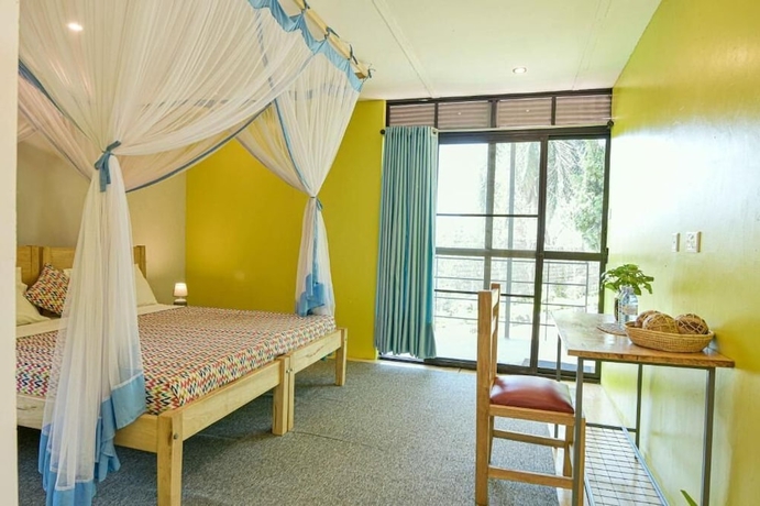 Imagen de la habitación del Hotel Cycad Entebbe Guest House. Foto 1