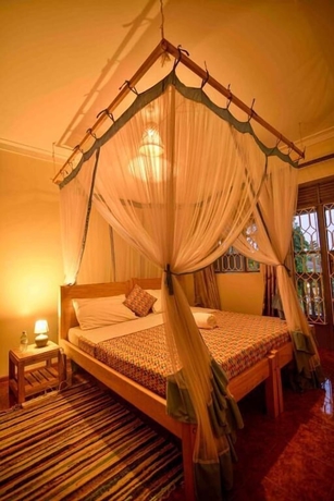 Imagen de la habitación del Hotel Cycad Entebbe Guest House. Foto 2