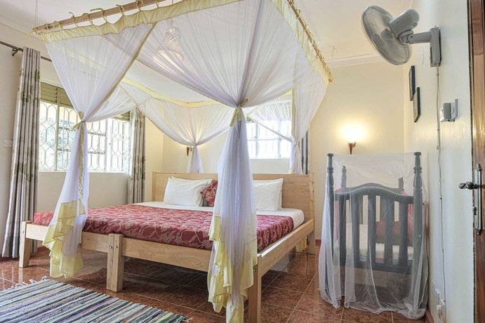 Imagen de la habitación del Hotel Cycad Entebbe Guest House. Foto 4
