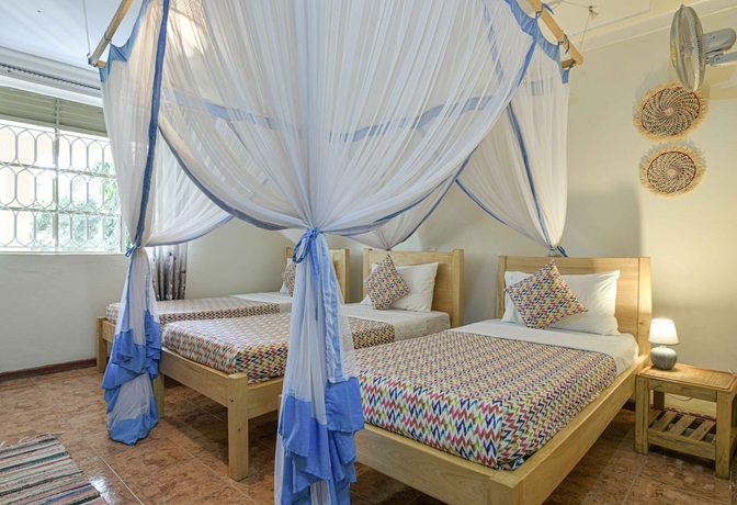Imagen de la habitación del Hotel Cycad Entebbe Guest House. Foto 5