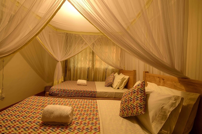Imagen de la habitación del Hotel Cycad Entebbe Guest House. Foto 6