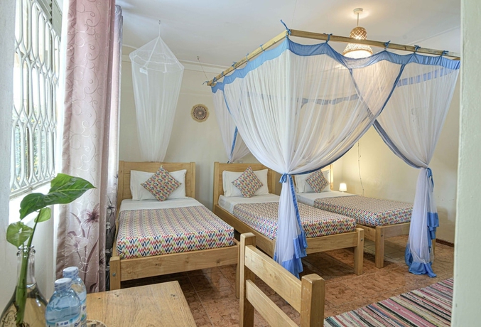 Imagen de la habitación del Hotel Cycad Entebbe Guest House. Foto 9