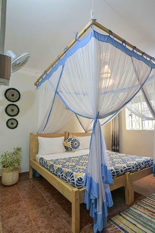 Imagen de la habitación del Hotel Cycad Entebbe Guest House. Foto 10