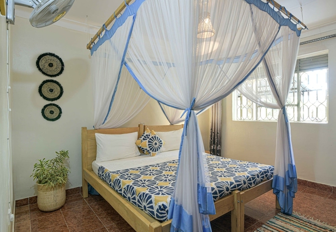 Imagen de la habitación del Hotel Cycad Entebbe Guest House. Foto 11