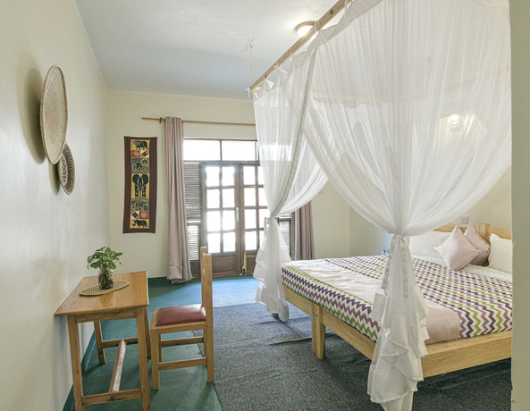 Imagen de la habitación del Hotel Cycad Entebbe Guest House. Foto 14