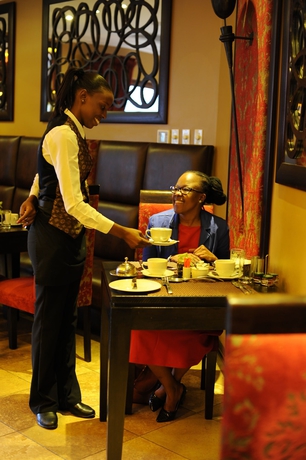 Imagen del bar/restaurante del Hotel Cycad Guest House. Foto 3