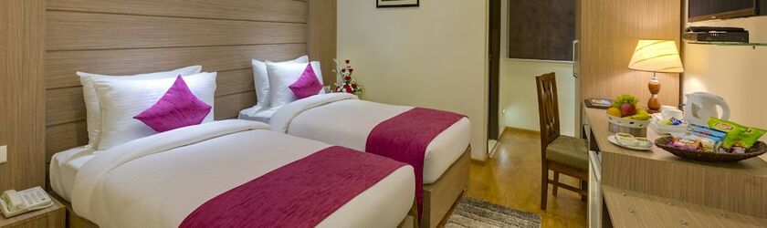 Imagen de la habitación del Hotel Cygnett Inn Guwahati. Foto 13