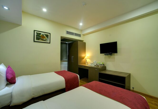 Imagen de la habitación del Hotel Cygnett Inn Guwahati. Foto 17