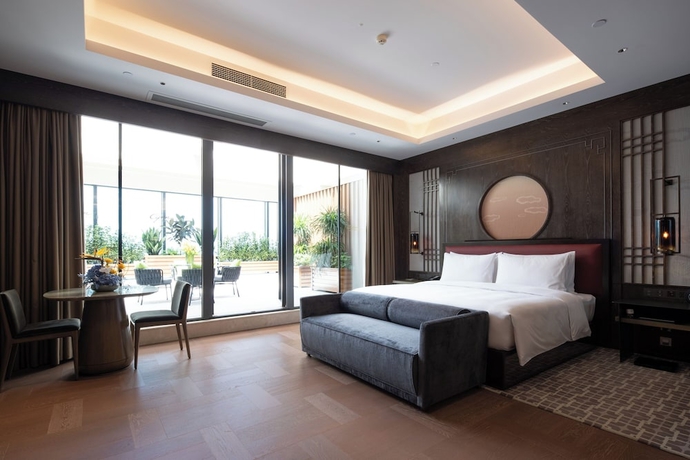 Imagen de la habitación del Hotel Cynn Xanadu Chengdu. Foto 12