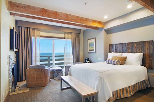 Imagen de la habitación del Hotel Cypress Inn On Miramar Beach. Foto 2