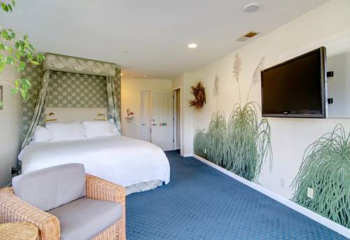 Imagen de la habitación del Hotel Cypress Inn On Miramar Beach. Foto 3