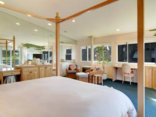 Imagen de la habitación del Hotel Cypress Inn On Miramar Beach. Foto 6